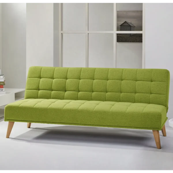 A lime green Aquila Click Clack sofabed with a quilted texture in a modern living room setting.